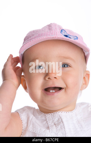 Porträt eines lächelnden Mädchens mit einer Kappe Stockfoto
