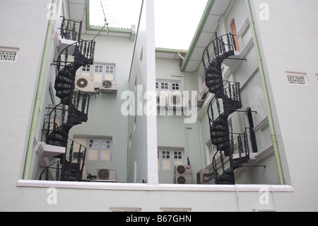 Alte Eisen Spiral Stair Fall Singapur Stockfoto