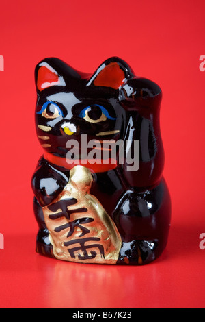 Nahaufnahme von einem Maneki neko Stockfoto