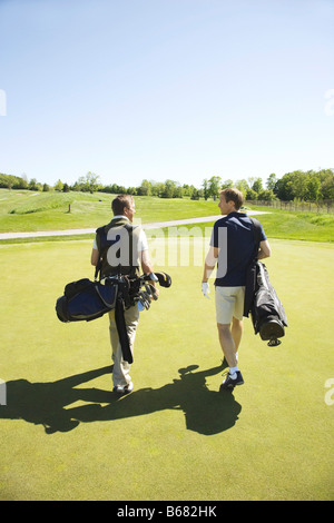 Golfer auf Putting Green Stockfoto