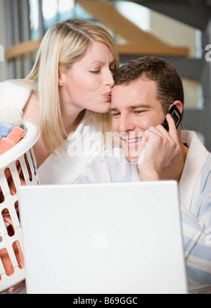 Ein paar Arbeiten von Zuhause Stockfoto