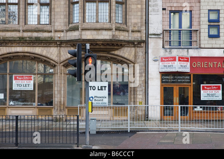 Die Rezession beißt, Geschäfte, lassen sich in Birmingham, "Stop", 'Red Man', "Nicht überqueren", Ampel Stockfoto