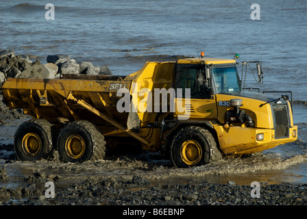 Bell-Muldenkipper, Küstenschutz, Osten Lane, Bawdsey, Suffolk, UK arbeiten. Stockfoto