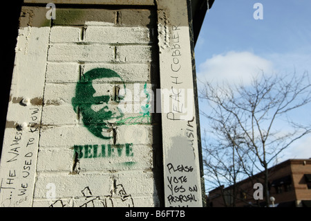 Graffiti auf eine Mauer mit Barack Obama glaube Slogan in Ann Arbor Michigan USA Stockfoto