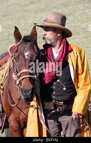 Es gibt eine Verbindung zwischen ein Cowboy und sein Pferd, auf der range Stockfoto