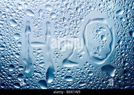 Tropfen auf Glas Stockfoto