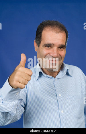 Mann Daumen nach oben Stockfoto