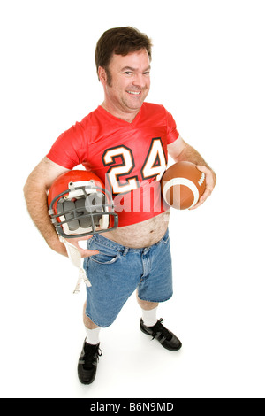 Applying Mann in seine Highschool-Football einheitliche Wiedererleben seiner Jugend Stockfoto