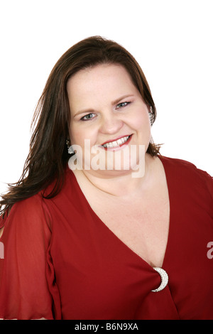 Porträt einer schönen plus Größe Modell in einem roten Urlaub Kleid weißen Hintergrund Stockfoto
