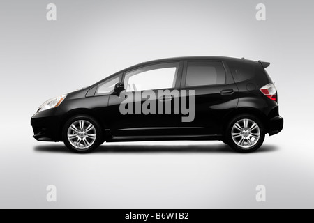 2009 Honda Fit Sport in schwarz - Treiber Seite Profil Stockfoto