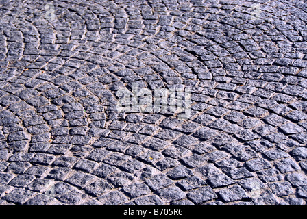 Hintergrund der alten Kopfsteinpflaster Stein Granit Pflaster Stockfoto