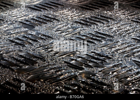 Künstlerische Nahaufnahme eines Stahls tread Platte Stockfoto