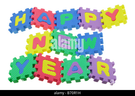 Bunte Alphabet-Puzzle-Blöcke montiert anzuzeigenden Happy New Year Stockfoto