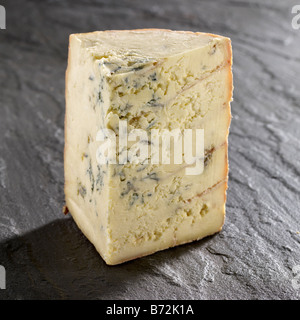 Stitchelton Käse Keil auf Schiefer Stockfoto