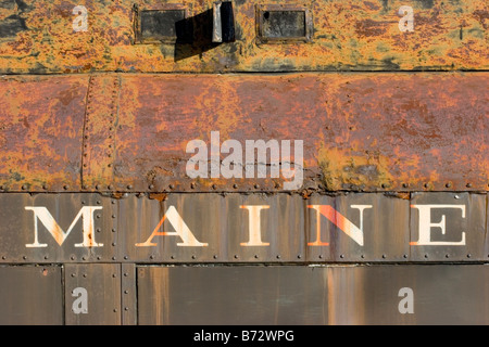 Die Wort "Maine" gemalt auf der rostigen alten Waggon Stockfoto