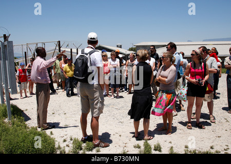 touristische Reisegruppe anhören der ehemaligen politischen Gefangenen Führer Robben Insel Cape Town-Südafrika Stockfoto