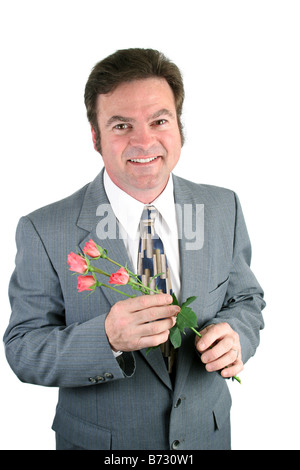 Ein liebevoller Ehemann hält Rosen für sein süßes Herz Stockfoto