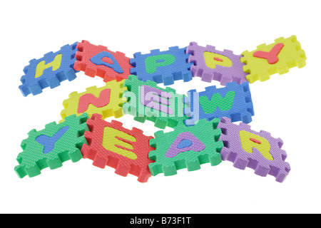 Bunte Alphabet-Puzzle-Blöcke montiert anzuzeigenden Happy New Year Stockfoto