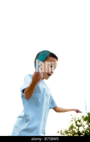 Sieben Jahre alter Junge mit Springseil, Winnipeg, Kanada Stockfoto