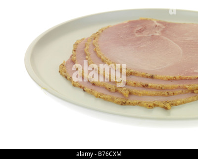 Frisch gekocht Scheiben kalter Wiltshire panierter Schinken Isoliert gegen einen weißen Hintergrund mit keine Menschen und einen Freistellungspfad Stockfoto