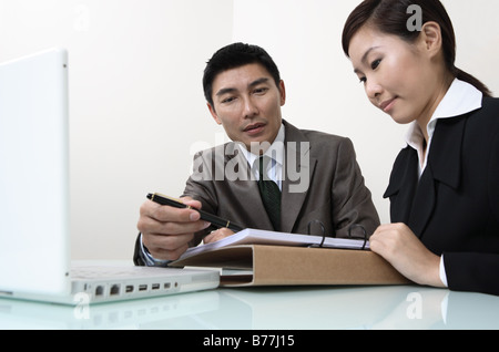 Asiatische Executive bei der Arbeit Stockfoto