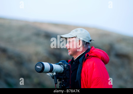 Ein professioneller Fotograf im Auftrag in der Mongolei. Stockfoto