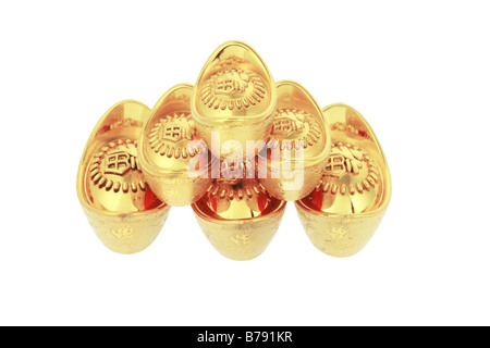Chinesisches Neujahr gold Barren Ornamente auf weißem Hintergrund Stockfoto