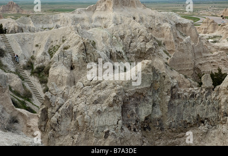 Mike Vining auf der Log-Leiter Notch Trail Badlands N P South Dakota USA Stockfoto