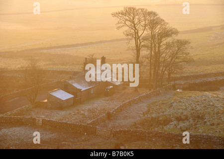 Dunstige Abendlicht auf Farm Peel aus Stahl Rigg Northumberland Stockfoto