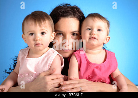 Mutter und Kind Mather und Zwillinge Stockfoto