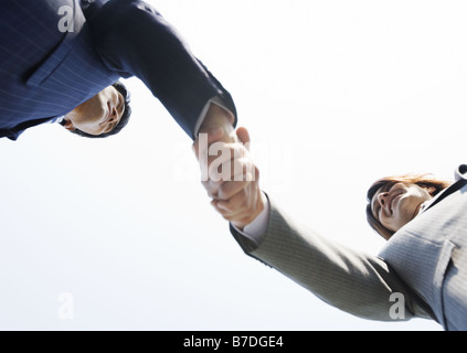 Geschäftsleute, die Hände schütteln Stockfoto