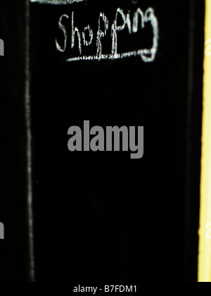 Tafel mit "Shopping" darauf geschrieben. Stockfoto