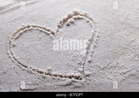 Herz im Sand mit textfreiraum gezeichnet Stockfoto