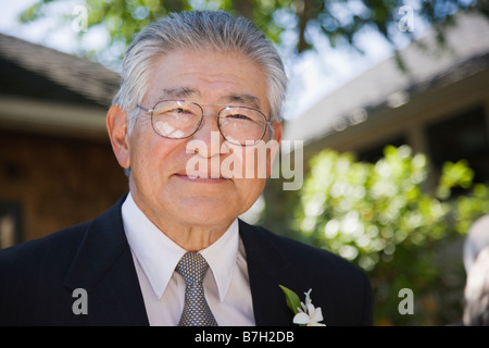 Senior asiatischen Mann lächelnd Stockfoto