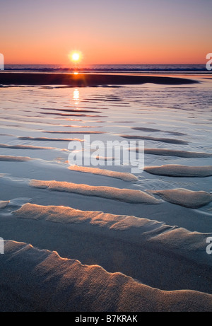 Sonnenuntergang am Sennen Cove Beach, Cornwall, UK Stockfoto