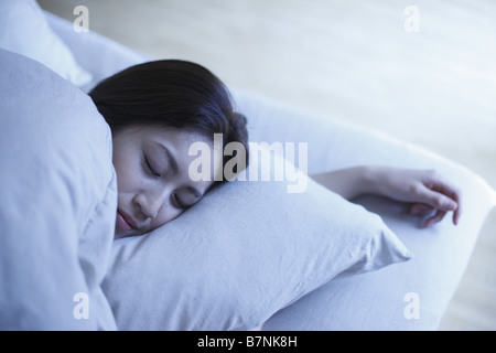 Eine schlafende Frau Stockfoto