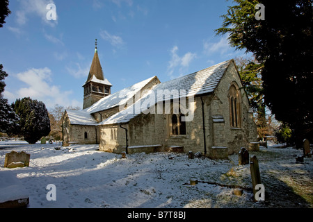 St.-Bartholomäus Kirche an Leigh Surrey im Schnee Stockfoto