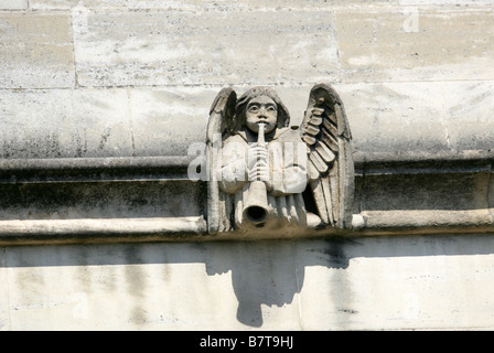 Engel spielt Trompete Galionsfigur Schnitzwerk am Magdalen College, Oxford University, Oxford, Oxfordshire, Vereinigtes Königreich Stockfoto