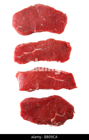 Rohes, rotes Fleisch isoliert auf weißem vier Stücke von Rindfleisch im Studio gedreht Stockfoto