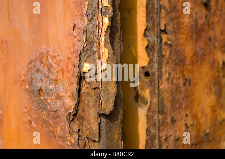 Nahaufnahme von Orange Rusty Metall Stockfoto