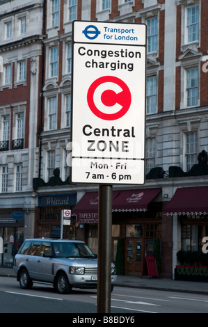 Staus Kosten Schild am Zonengrenze London England UK Stockfoto