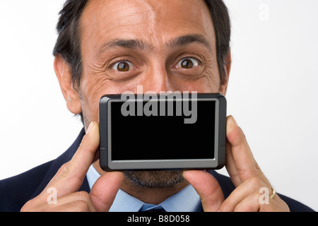 Ihre Anzeige geht hier Platz auf Hand-held Gerät Bildschirm kopieren Stockfoto