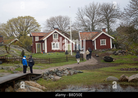 Amerikanische Touristen auf Bullero Island im schwedischen Schären Schweden Ostsee Stockfoto