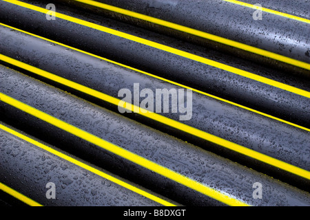 Muster von Erdgas Rohrleitungen Stapel gebildet. Stockfoto