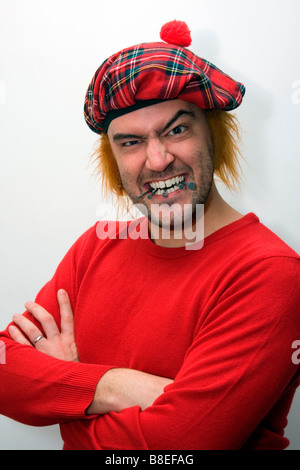 Wütend Scotsman kauen Nägel. Stockfoto