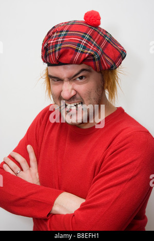 Wütend Scotsman kauen Nägel. Stockfoto