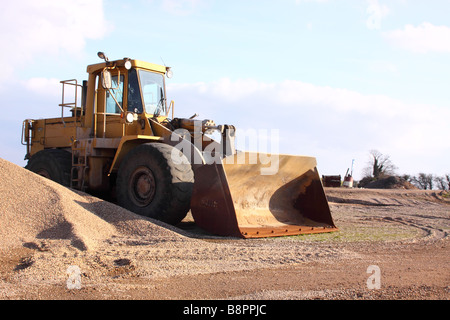 Bulldozer oder Bagger zum Verschieben in Cromwell Steinbruch verwendet extrahiert Sand und Kies auch Glas-recycling Stockfoto