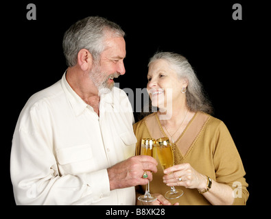 Applying paar feiern Silvester mit Sekt Stockfoto