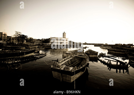 Komoren, Moroni Hafen, Grande Comore, Sonnenuntergang. Stockfoto