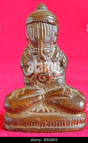 Miniatur Bronzestatue eines weinenden Buddha. Stockfoto